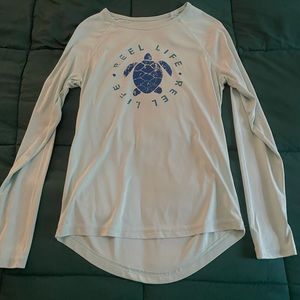 Sun resistant water shirt, can be worn in and out of water. Never worn before.